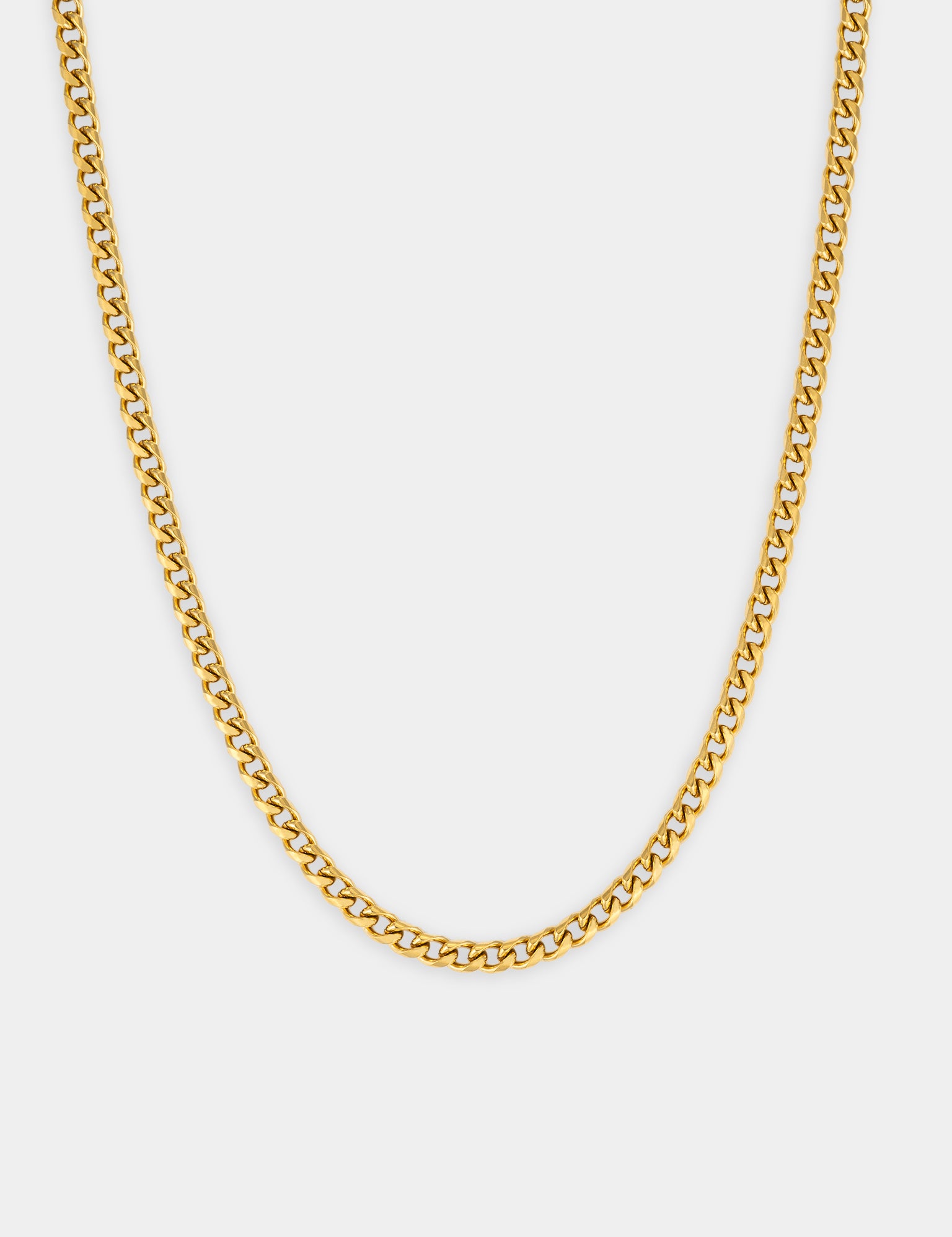 צילום מוצר של שרשרת Zeus מוזהבת ברוחב 4 מ״מ על רקע לבן